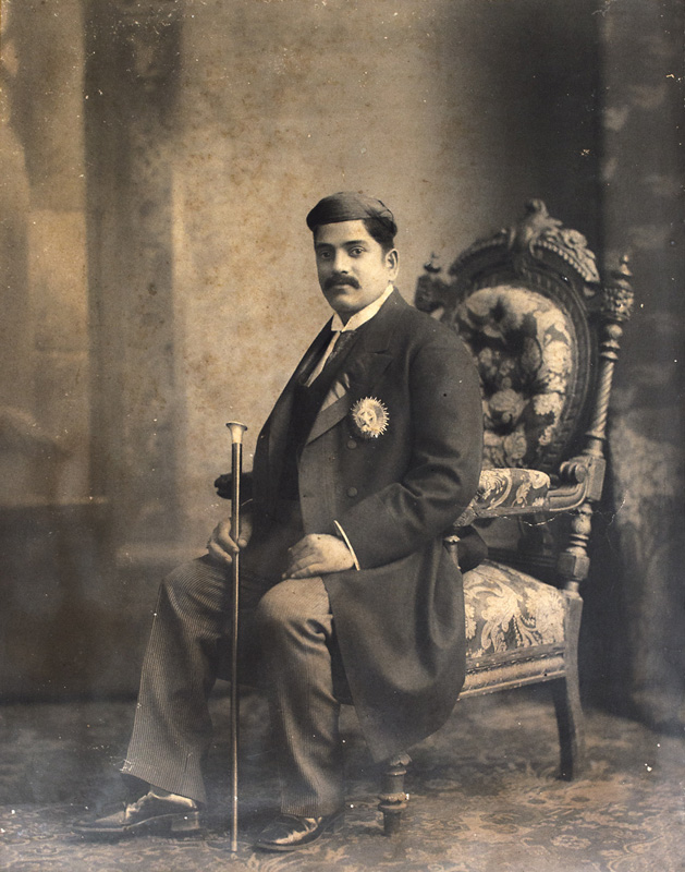 Sir Sayajirao Gaekwad III on a Victorian chair