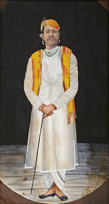 Full length portrait of Govardhanlalji standing with cane
